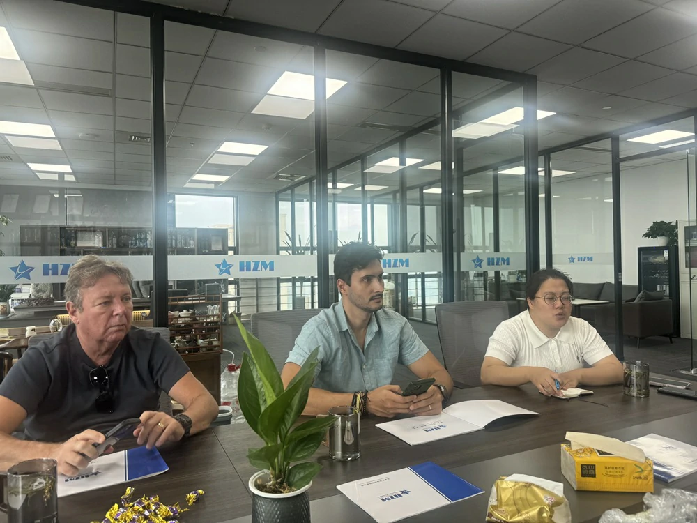 HZM Engineers Discussing a Beverage Production Line with Customers